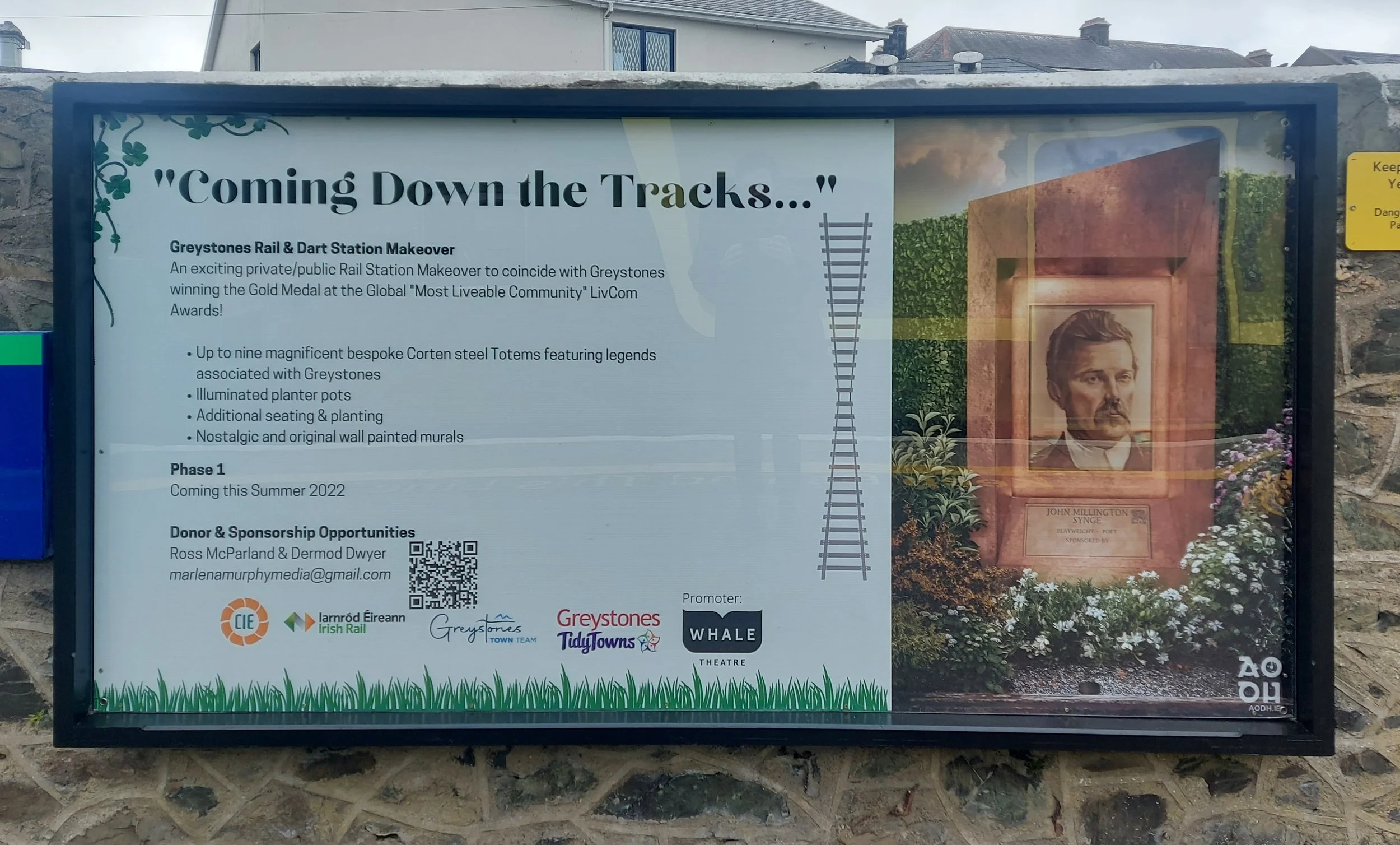 large erected poster showing the public the expected development of the totems to be installed at the train station
