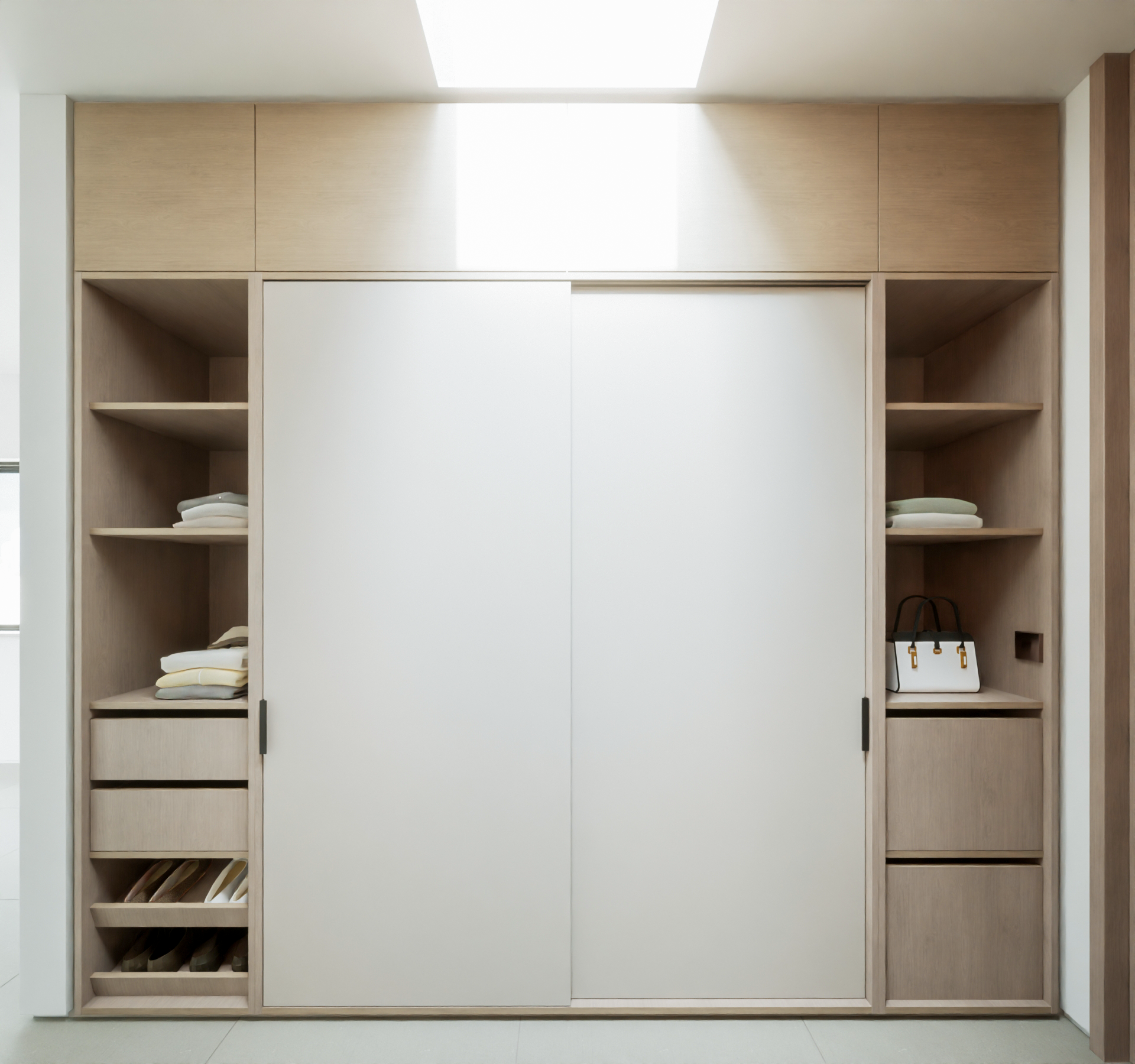 timber and off white sprayed white sliding door dressing room cabinets with exposed storage either side