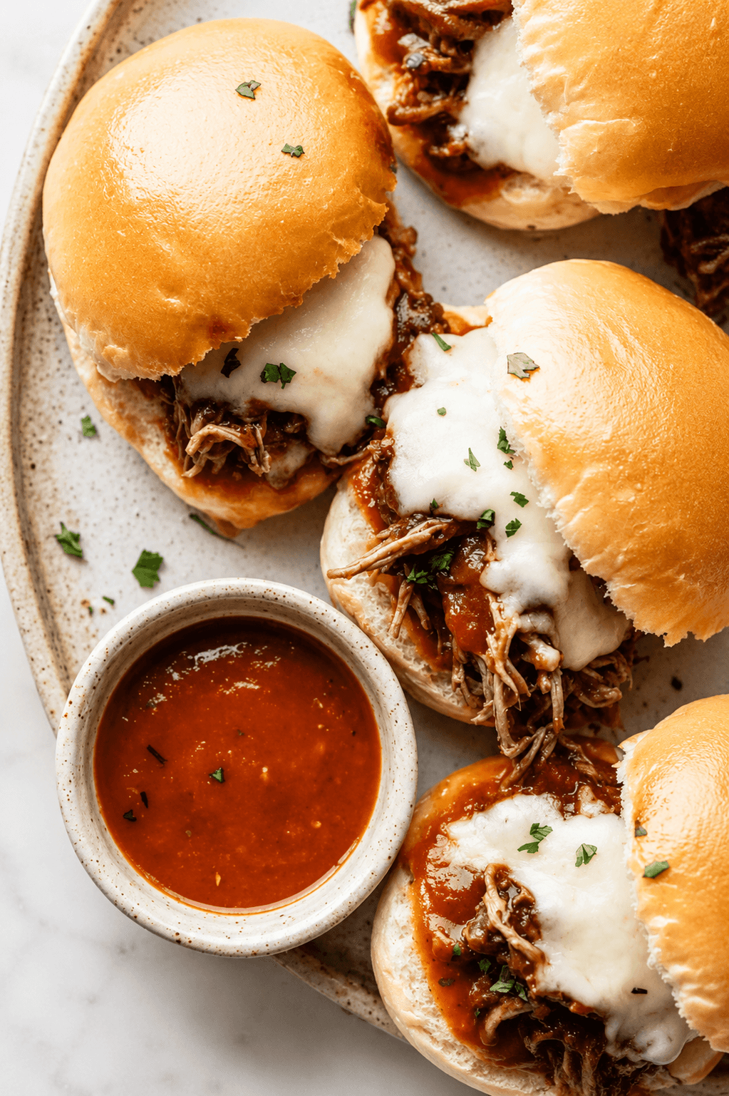 Cheesy Salsa Roja Shredded Beef Sliders