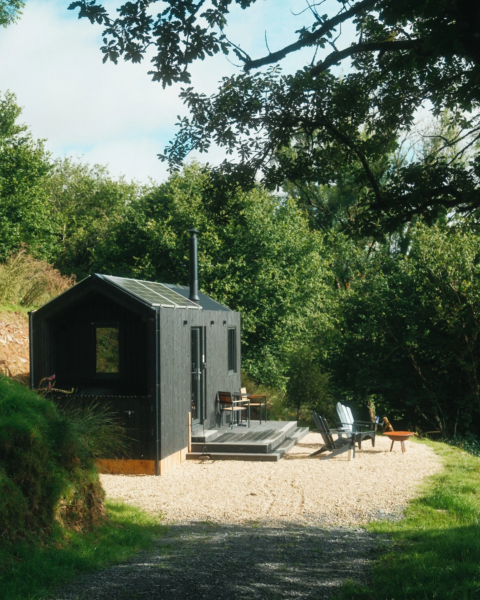 The Unplugged cabin at dusk, off the grid in Devon