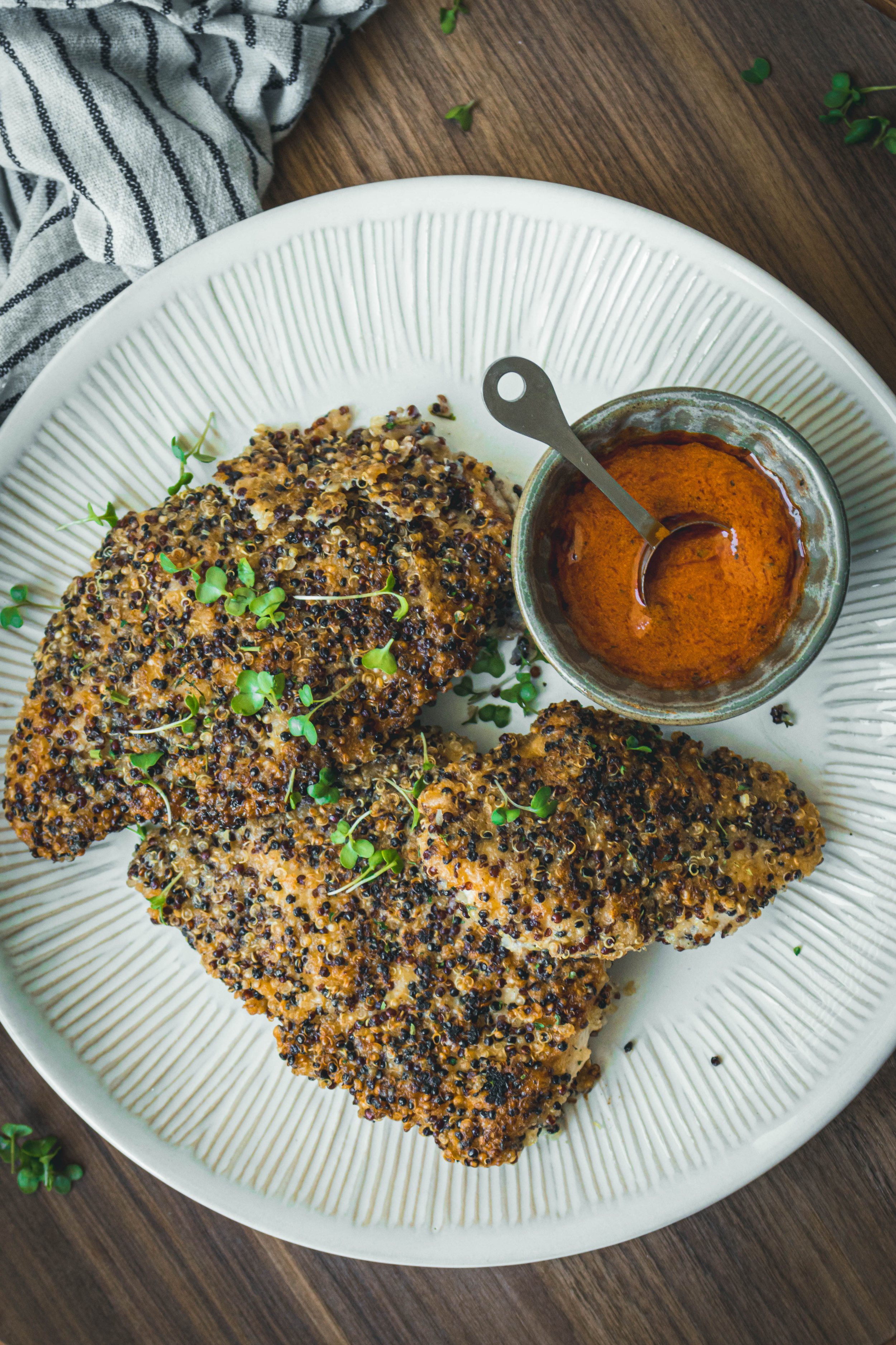 Garlicky Quinoa Crusted Chicken with Buffalo Sauce