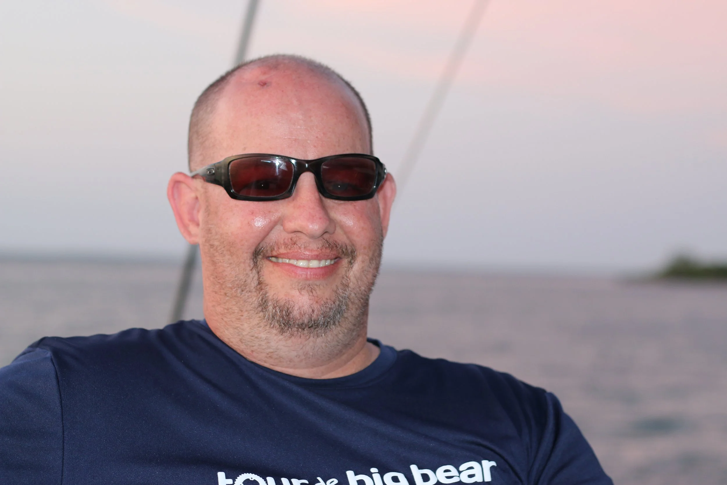 J. R. enjoying the sunset cruise back to the island