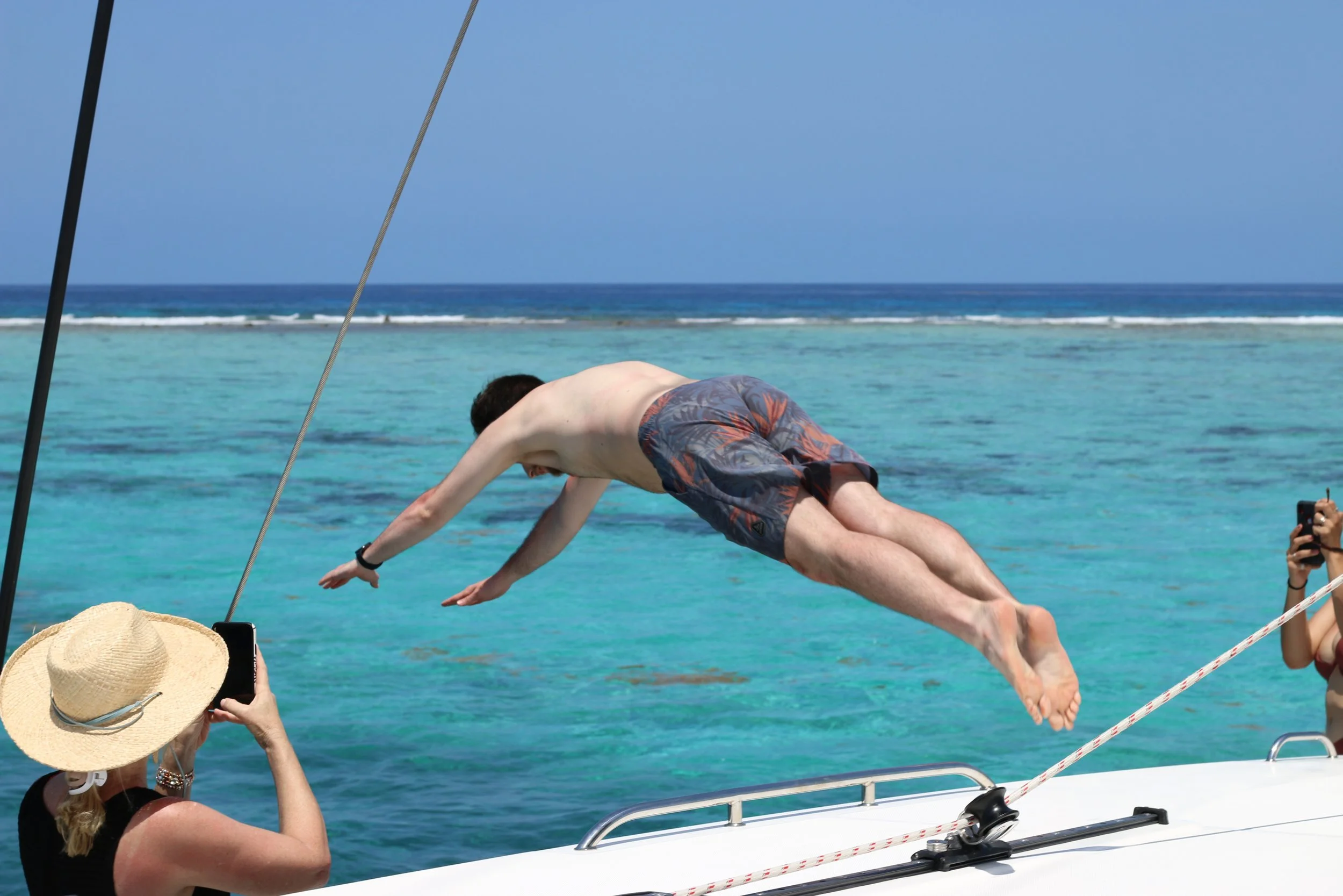 Michael dives ioff the boat to the reef