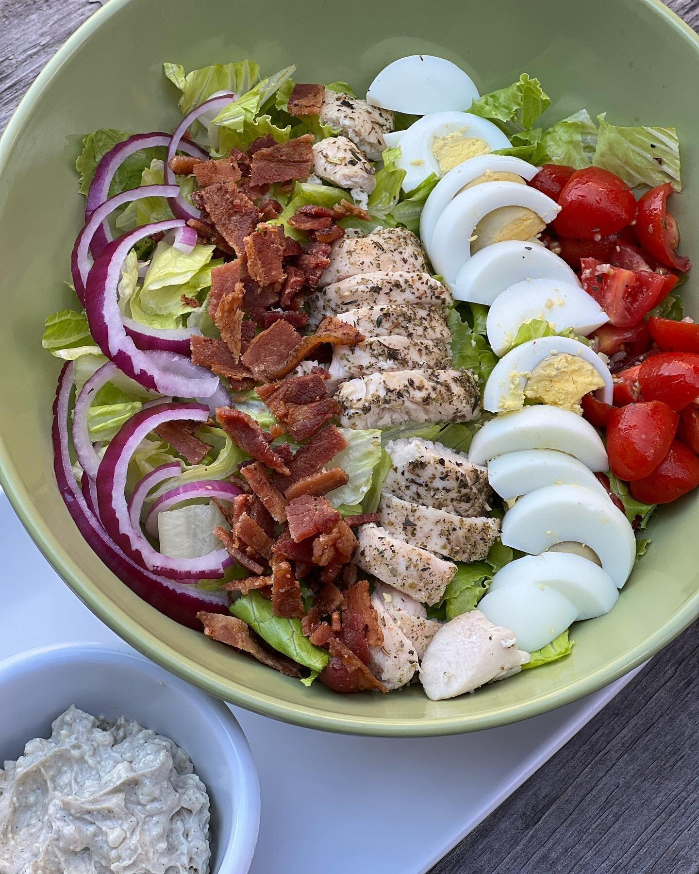 Beautiful day for a lunch date. Chicken Cobb Salad is on the menu today. 

Grilled chicken, our house-made bruschetta, crispy bacon, hard boiled eggs, red onions served over romaine lettuce with a house-made blue cheese dressing. 

We brought back th