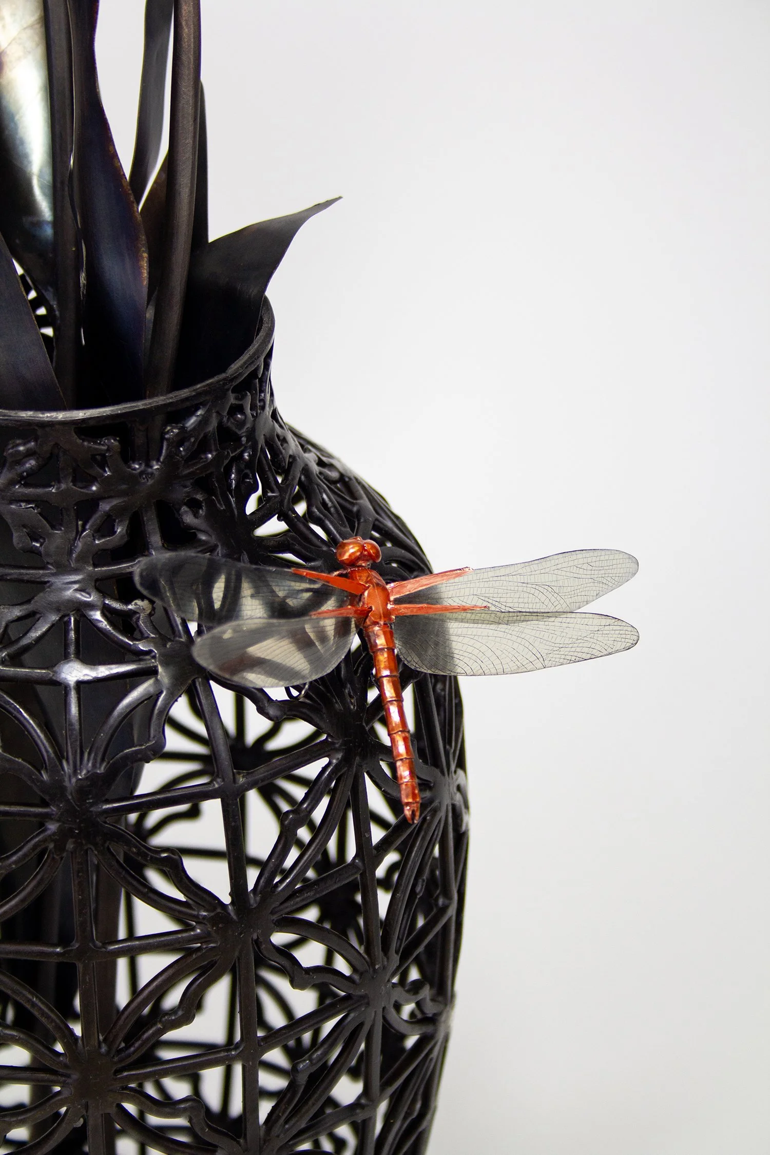 Darken | steel, copper, bronze, mica, gold leaf | 2025 | 25" high x 9" wide 