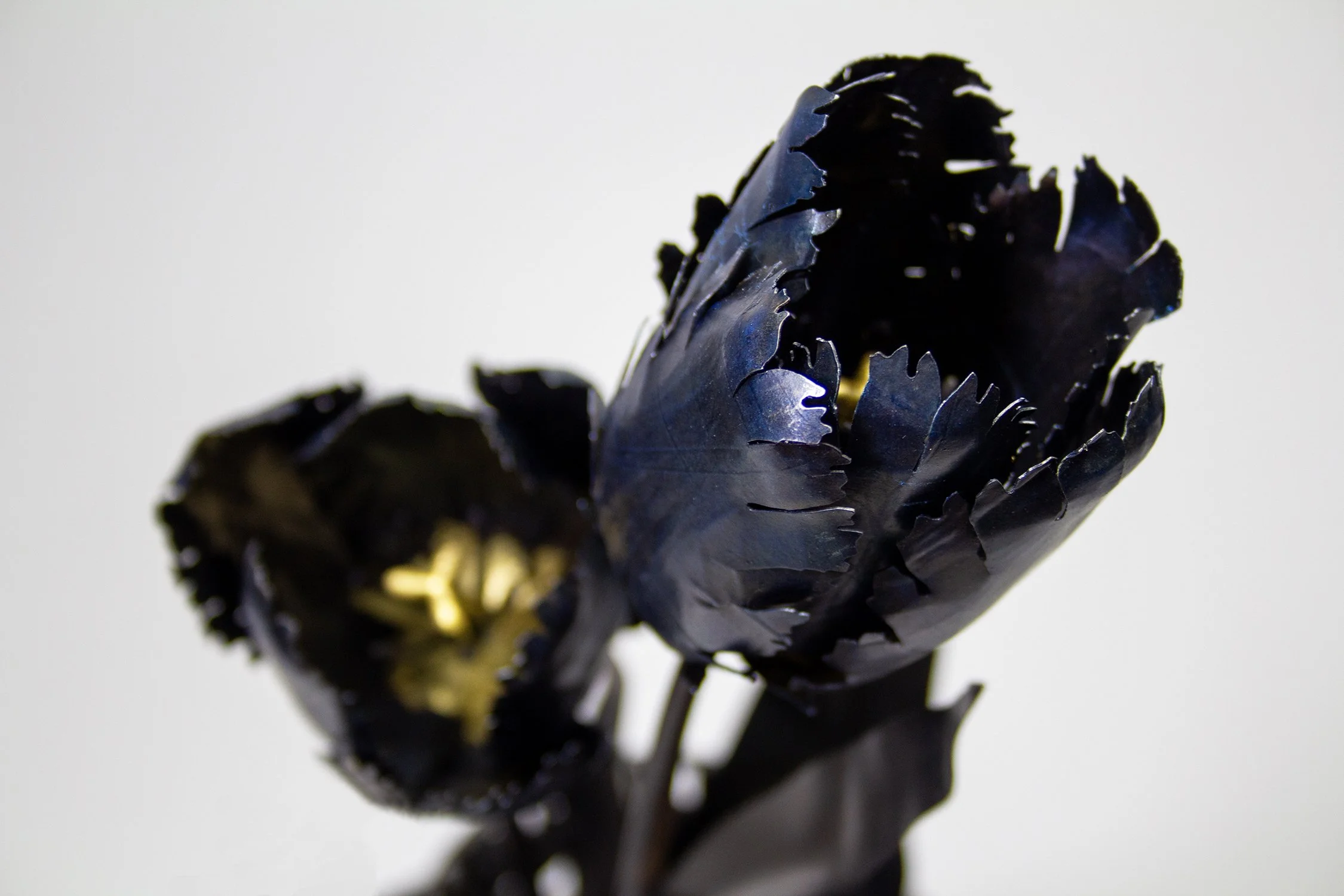 Darken | steel, copper, bronze, mica, gold leaf | 2025 | 25" high x 9" wide 