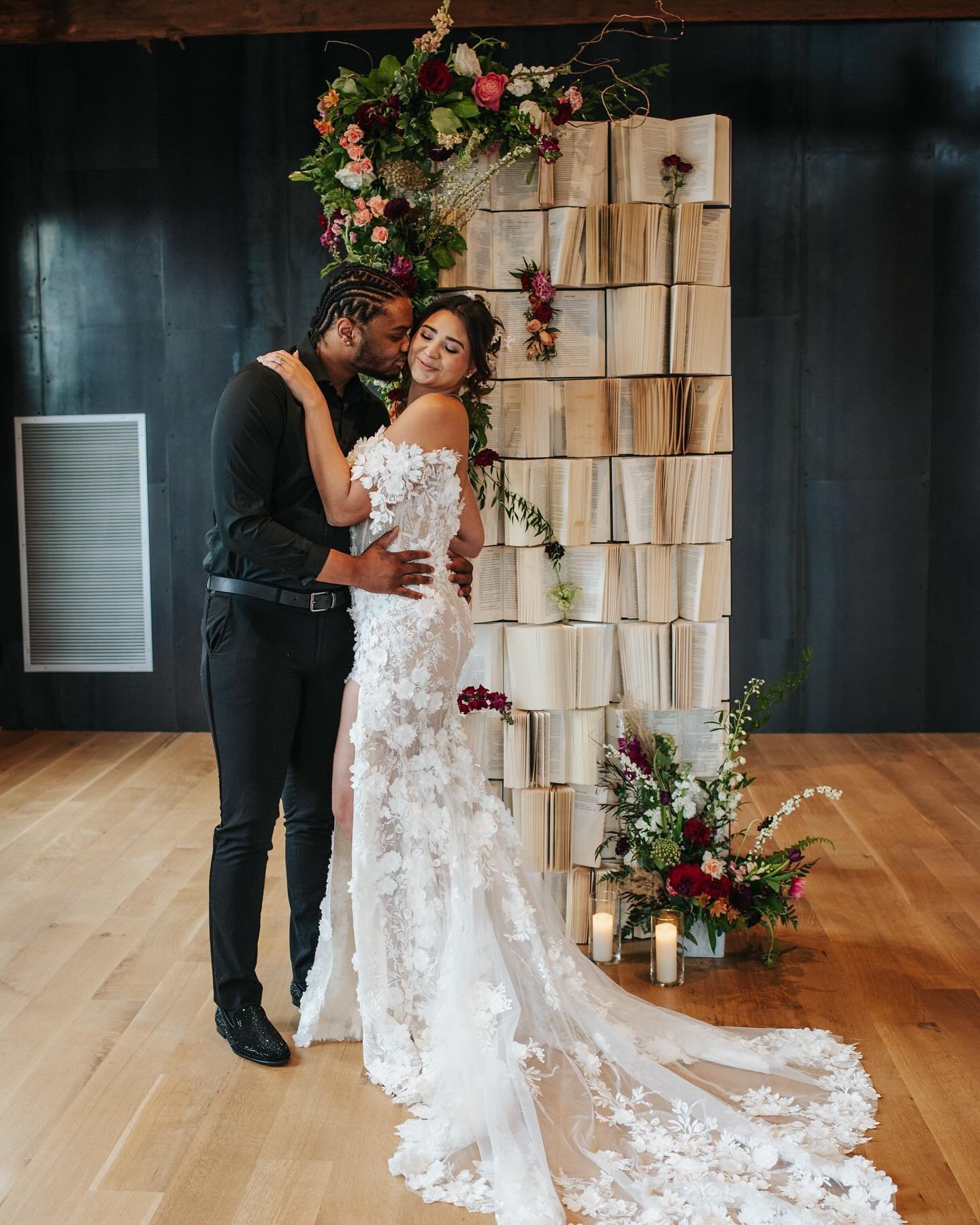 It&rsquo;s a love story.

Host &amp; Photos: @kimfleischerphoto 
Planner: @partydarling 
Florist: @studio.fleuraison 
Venue: @huntersawpgh 
Book backdrop: @partyscenedesign 
Dress: @onewhitelane 
Hair: @jessicaerin.artistry 
Makeup: @lmg.makeup 
Cham