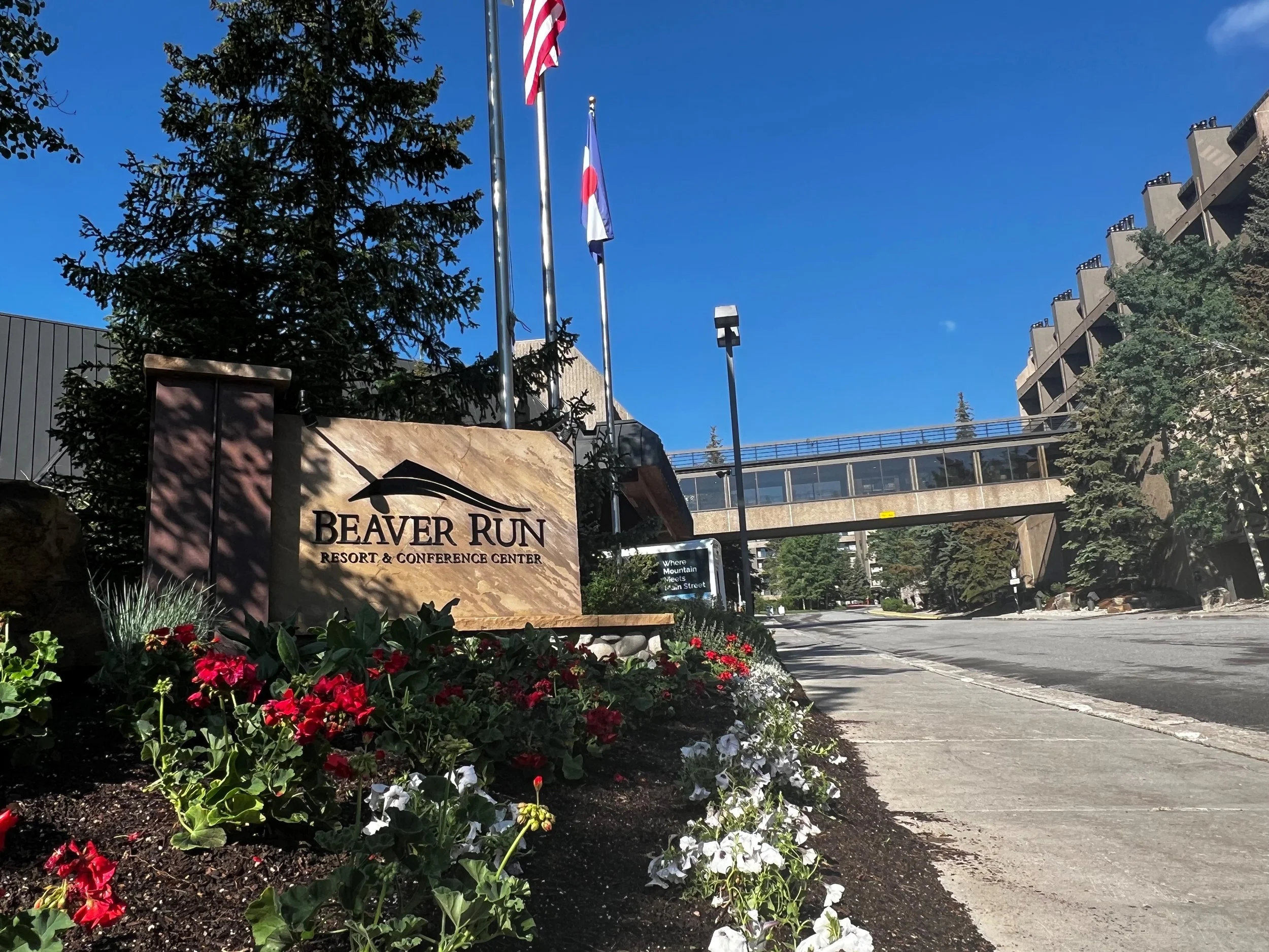lobby sign with flowers.jpg