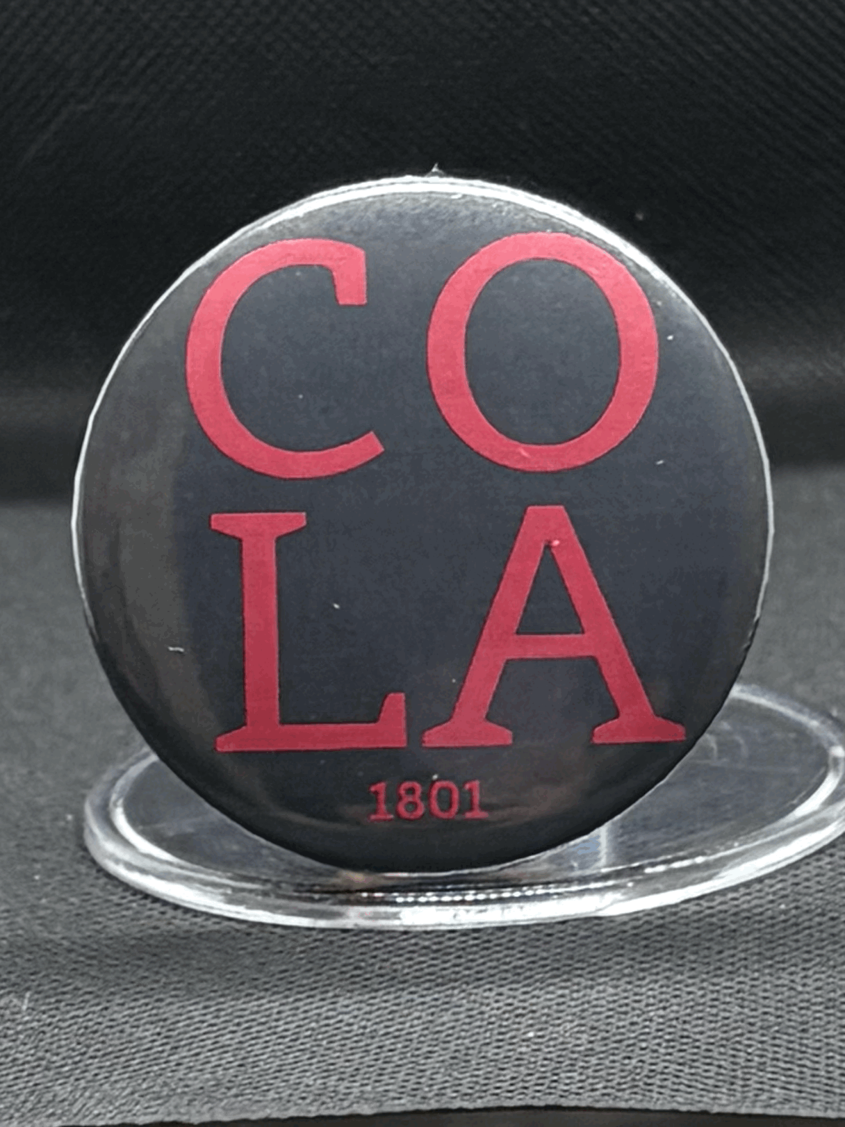 COLA BUTTON