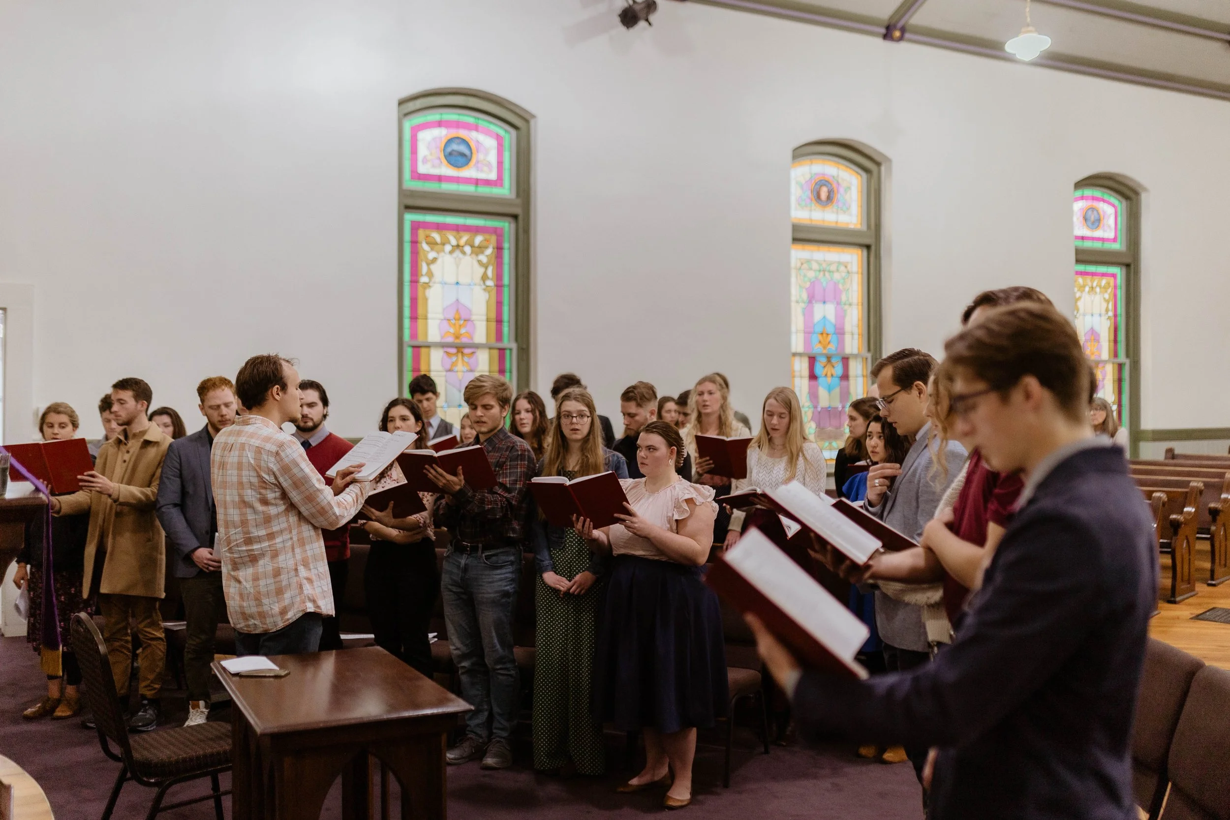 A group of classical students during daily prayer service.