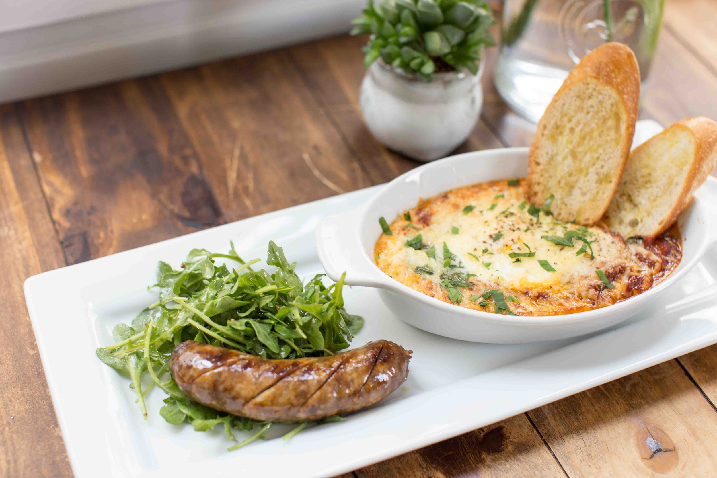 Italian Eggs and Sausage Serged With Micro Greens Tossed In A Light Vinaigrette