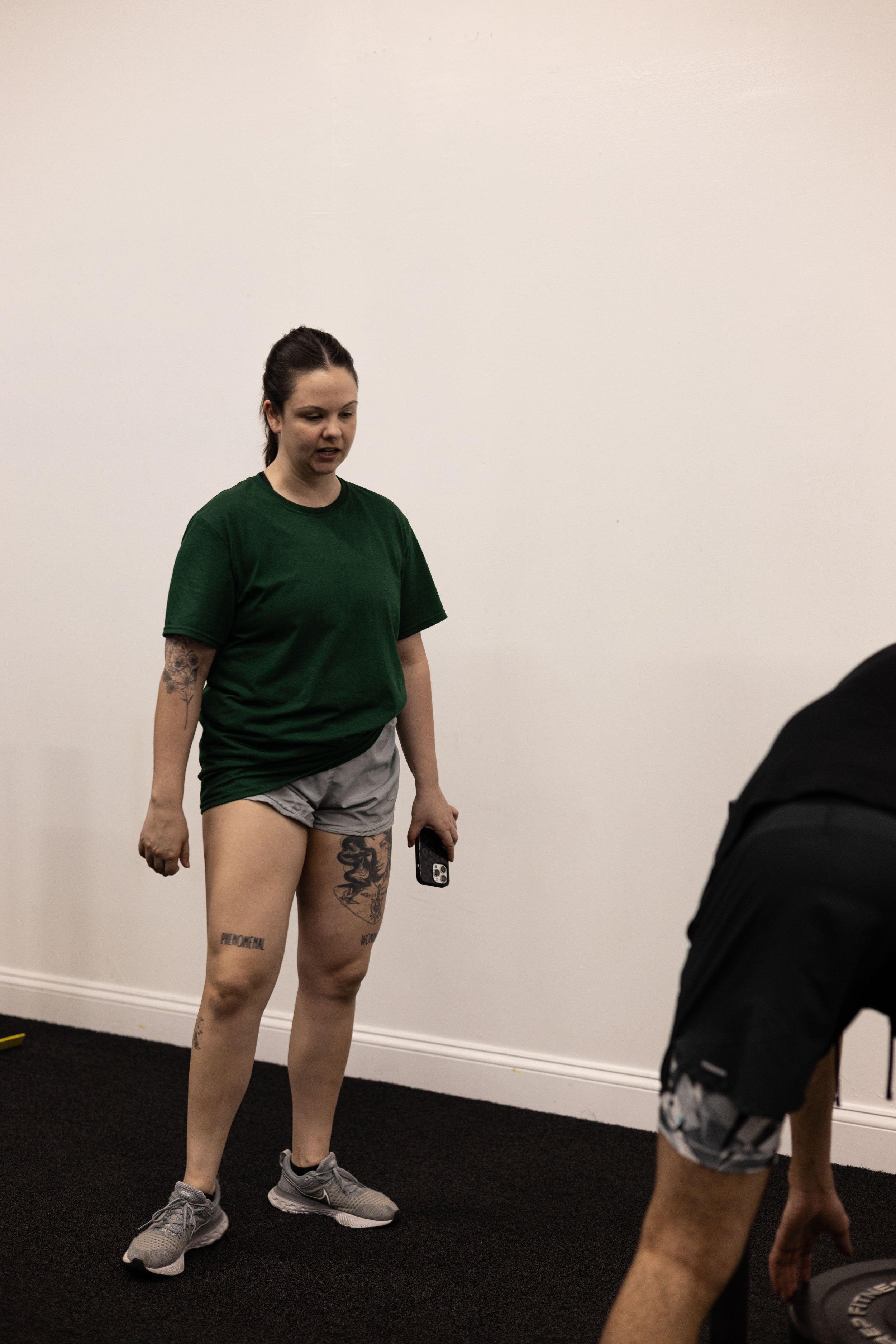 athlete performing plyometric training on turf during return-to-sport rehabilitation