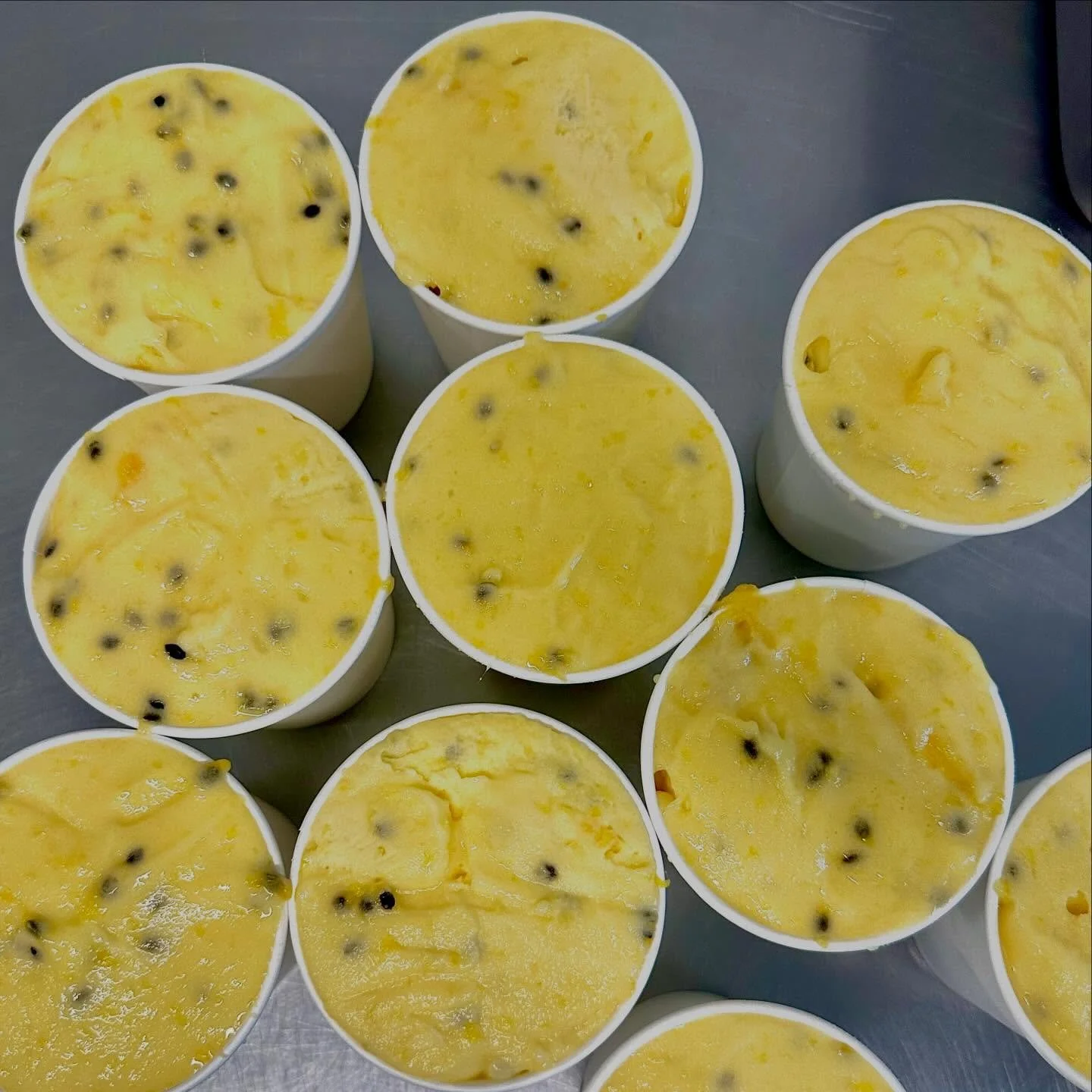 Passion fruit is the queen of all fruits. 
Been saving these seeds from the end of pf szn for something and of course, mix it with mango! 

✨passion fruit mango sorbet✨

The seeds make this a textural experience *chefs kiss* 

Well have limited amoun