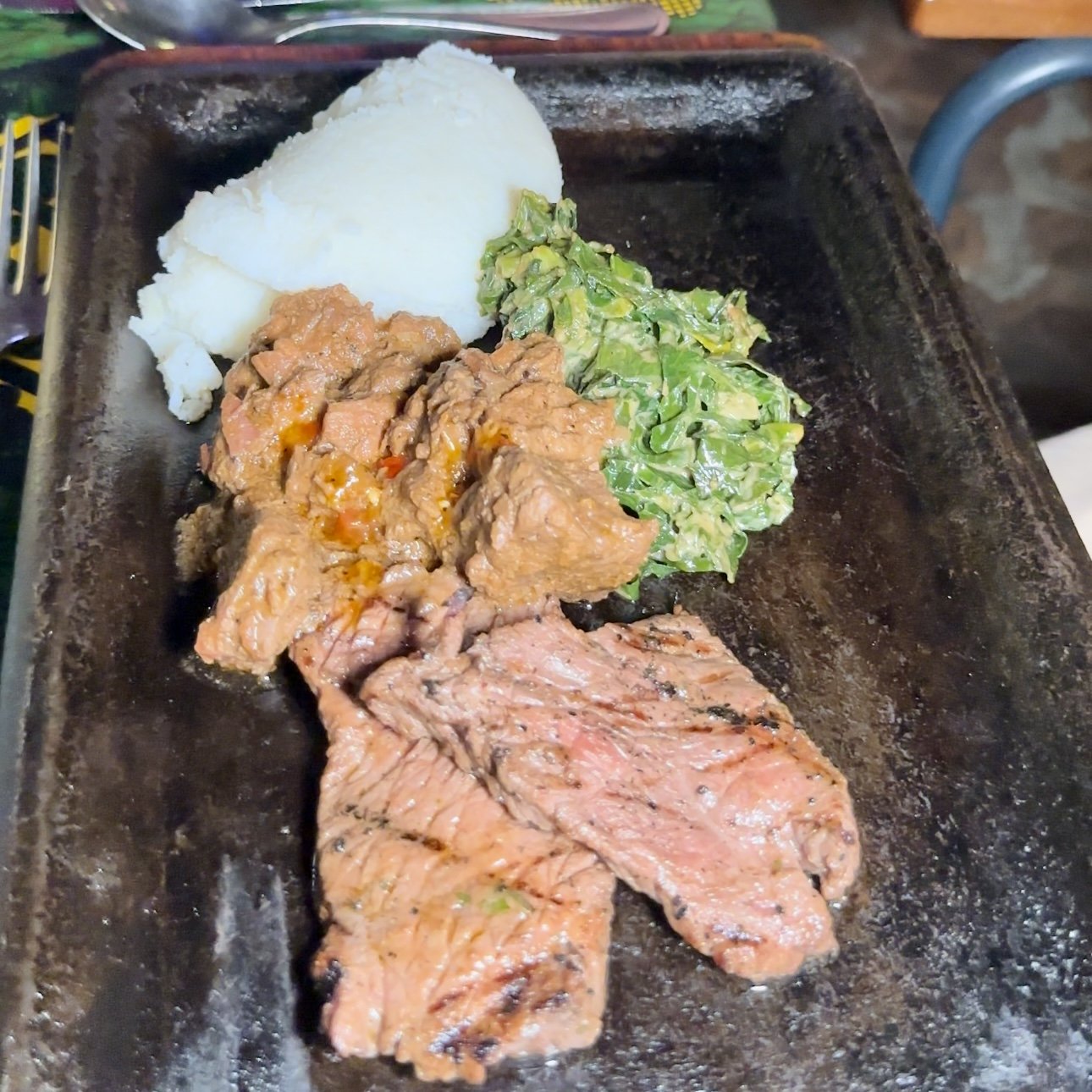 Impala Steak, Buffalo Stew, Sadza and Spinach with Crushed Peanuts