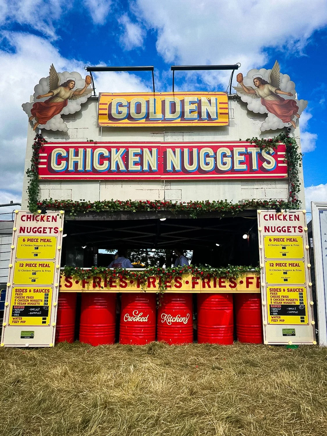Hand-painted signage for Crooked Kitchens – a travelling kitchen heading to festivals and events around the country, featuring bold, custom lettering in vibrant colours, showcasing the craftsmanship of Rich C Studio.
