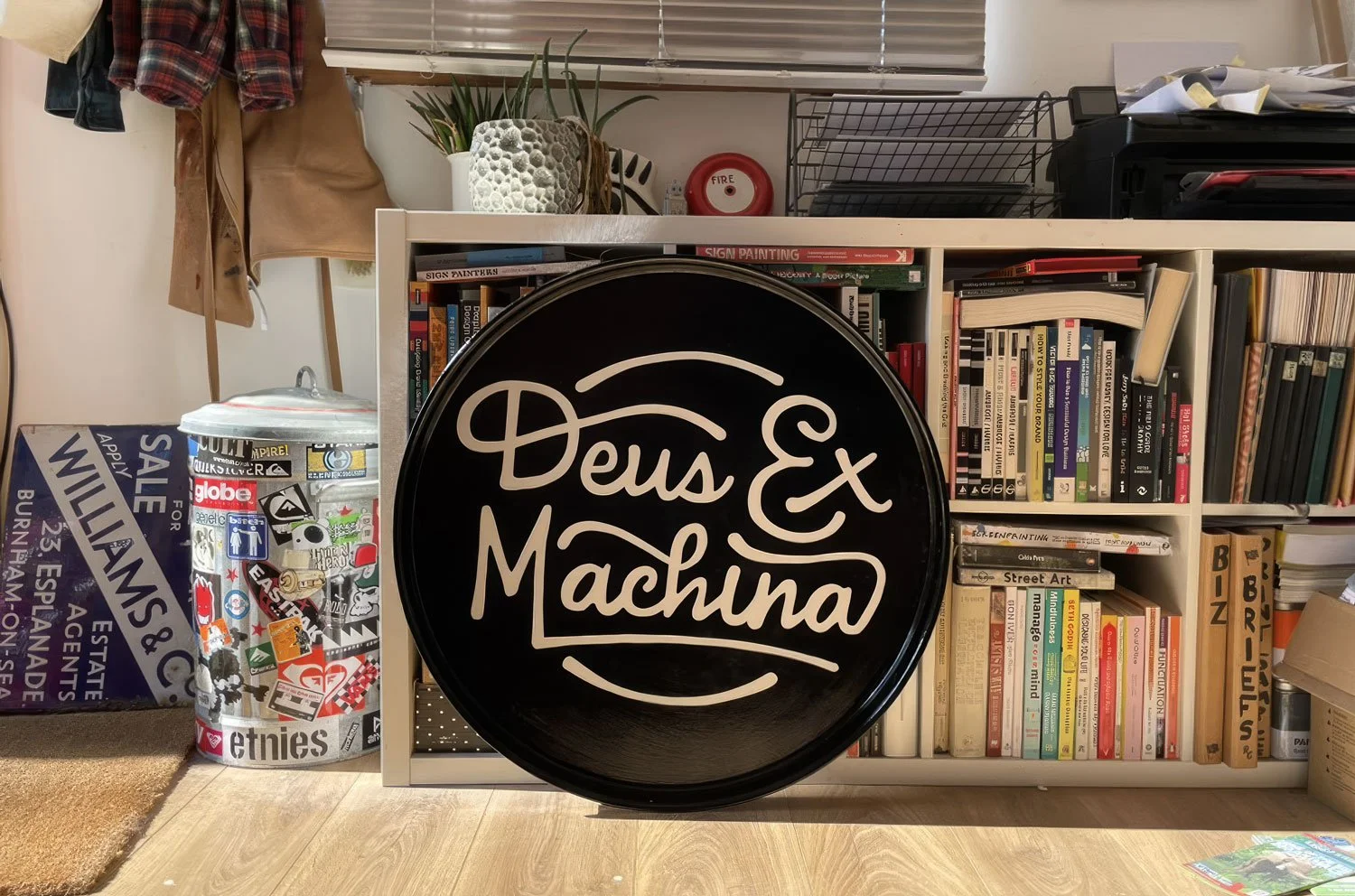 Deus Ex Machina logo signage