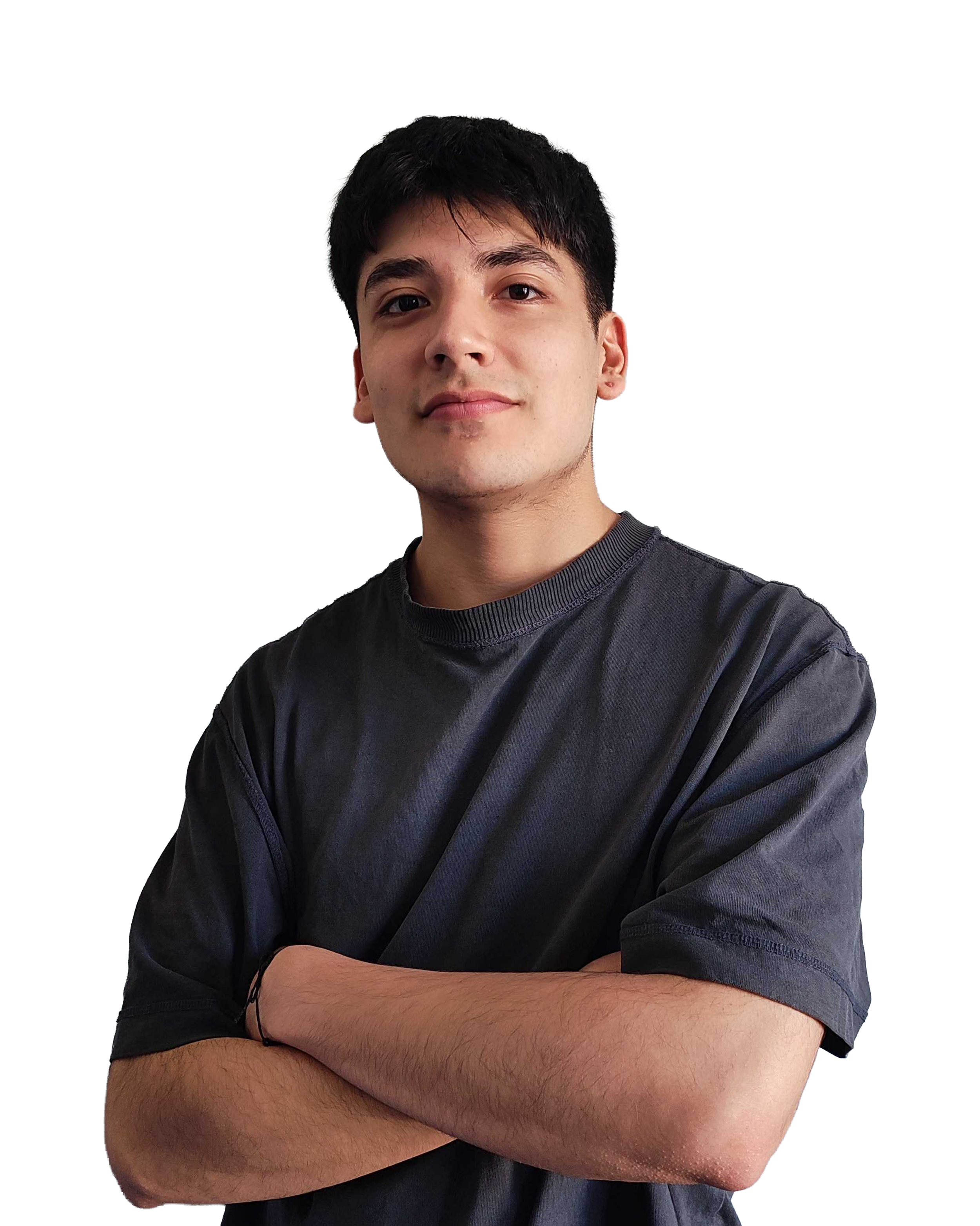 Young man with dark hair wearing a black T-shirt, standing with arms crossed, neutral expression, isolated on white background.