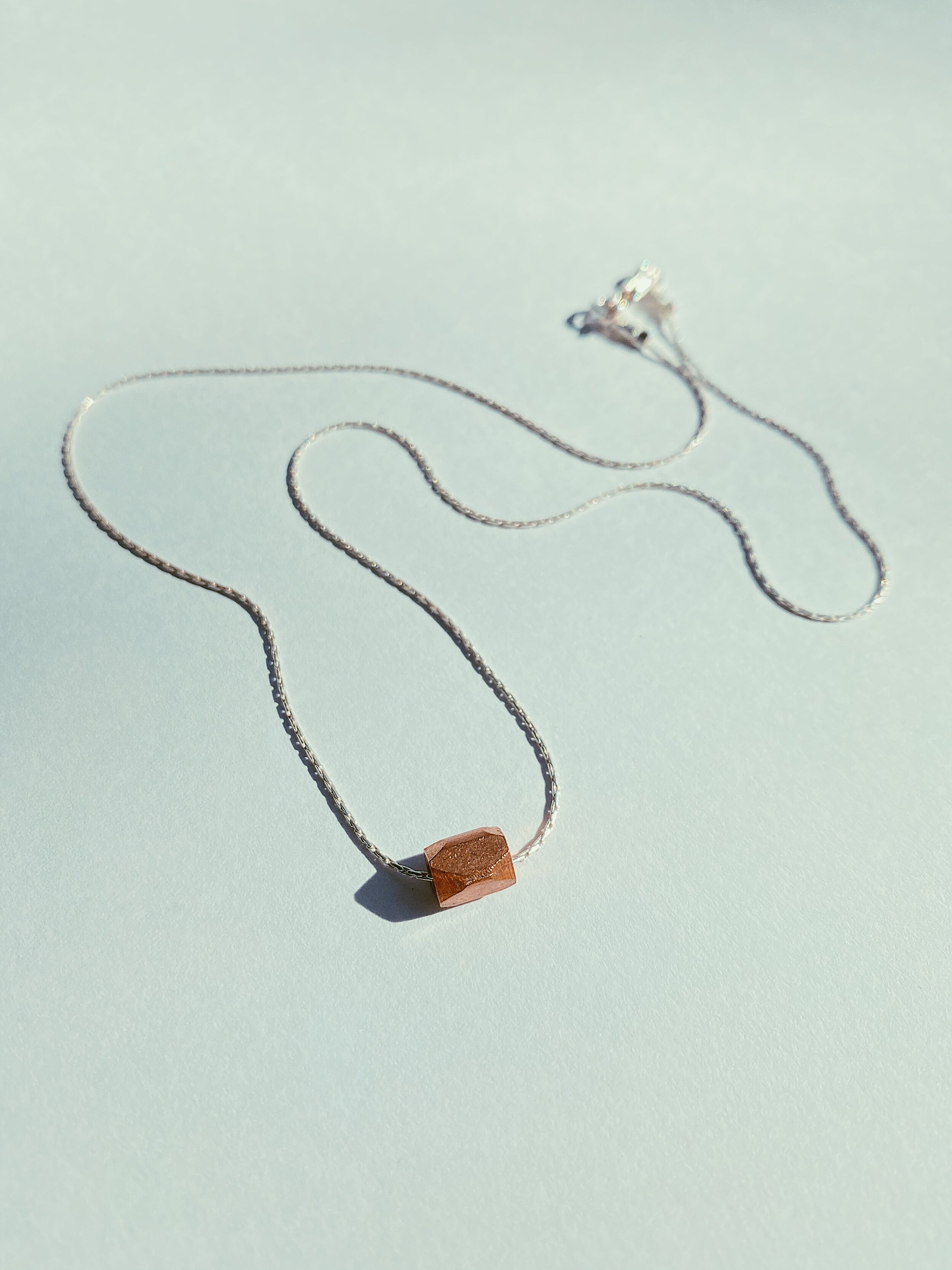 PROJEKT #23 - DRITTE Collection - SOLD --- An elegantly minimal option for everyday wear, PROJEKT #23 is a simple 14-inch solid sterling silver chain, adorned with a solid copper bead from Java. Copper is well known for its healing powers, and looks