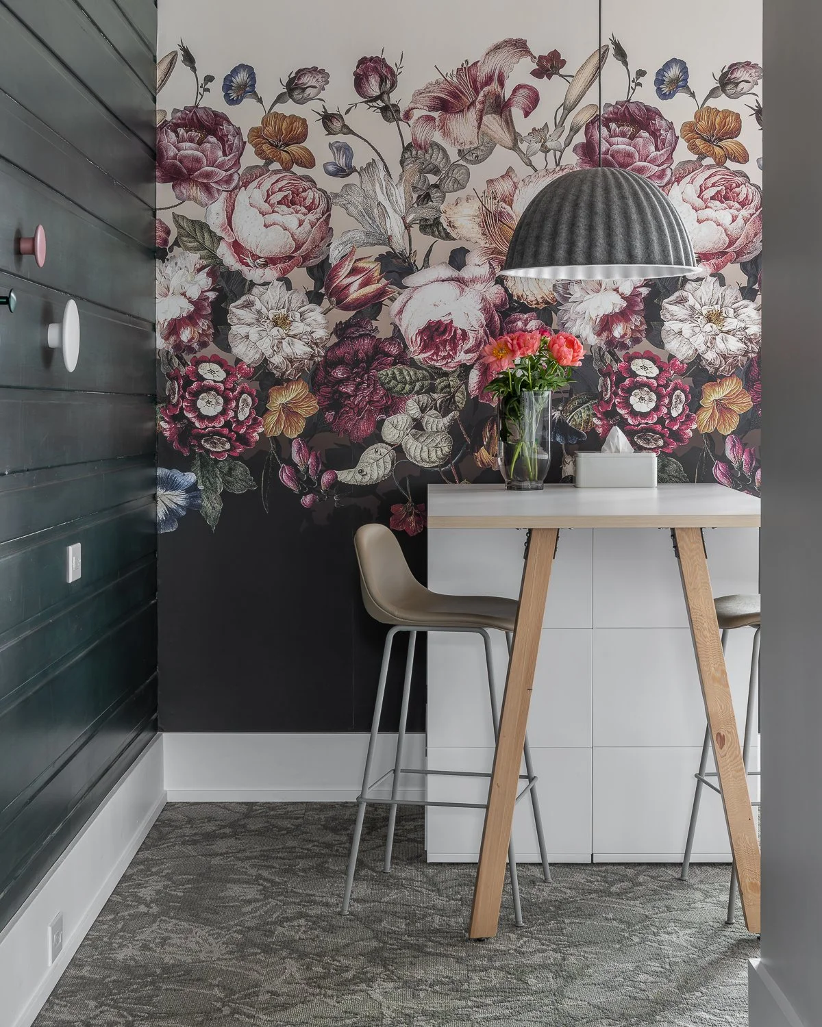 This corner is proof that small spaces can make a big statement. We paired a dramatic floral feature wall with modern furniture and natural textures to create the perfect mix. 

This setup is part of our showroom &mdash; designed to inspire and spark