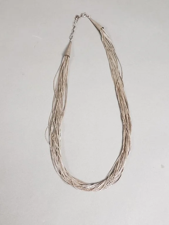 195_Lot_48_Native_American-style_30_strand_liquid_sterling.jpg