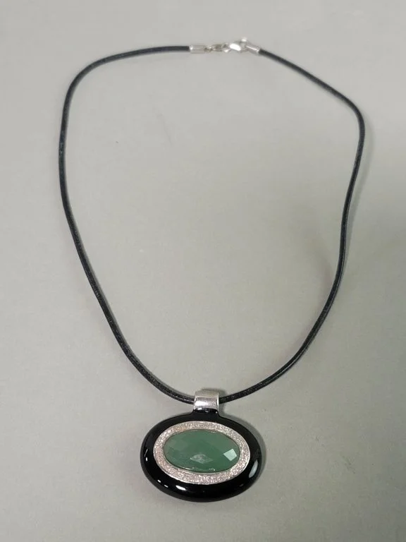 169_Lot_47_Vintage_sterling_silver_and_faceted_jade_pendant.jpg