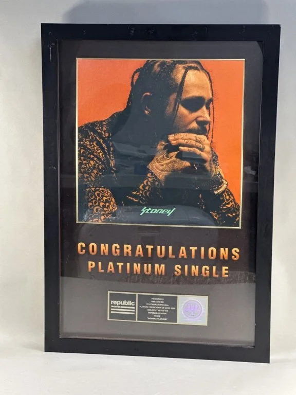 020_Lot_640_commemorative_Platinum_Single_award_for_Post.jpg