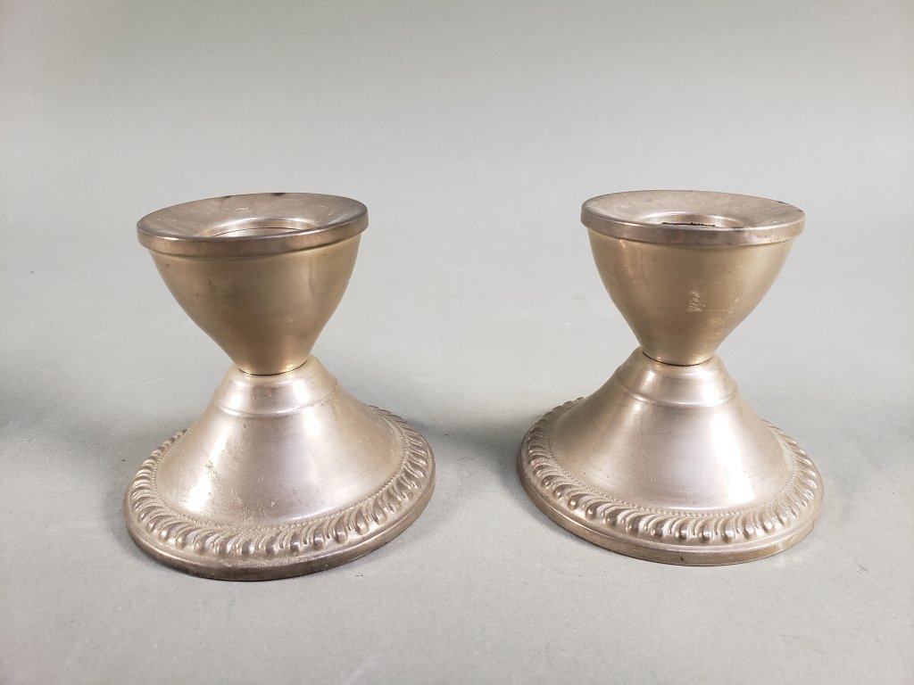 098_Lot_342_Pair_of_sterling_silver_candlesticks.jpg