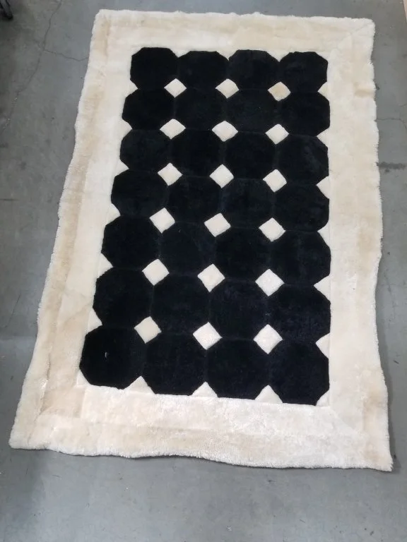 105_Lot_605_Cowhide_throw_rug.jpg