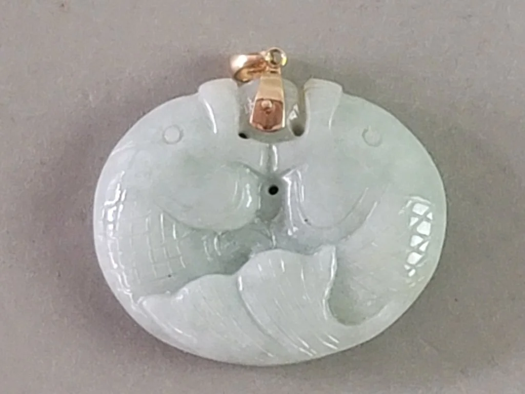 040_Lot_272_Jade_and_14k_gold_pisces_pendant.jpg