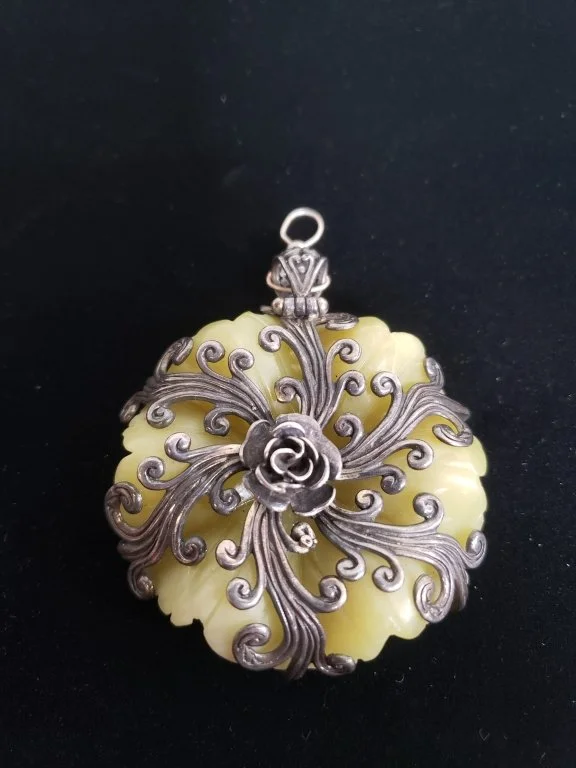 140 - Lot 32 - Vintage sterling silver and jadite floral pendant.jpg