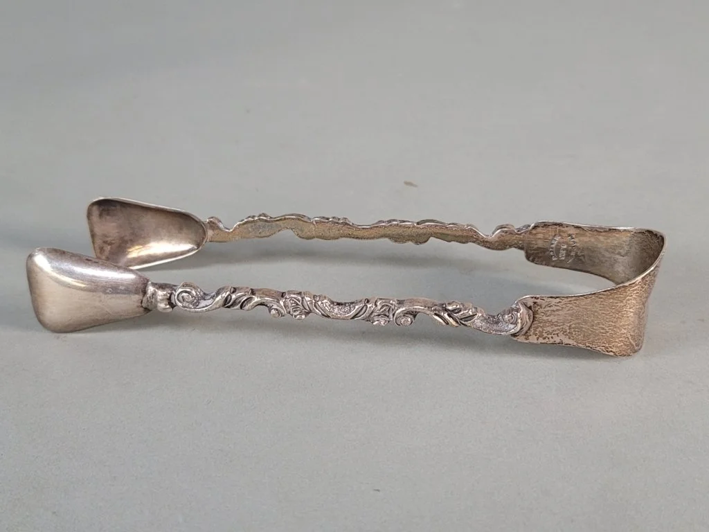 143 - Lot 433 - Sterling silver tongs.jpg