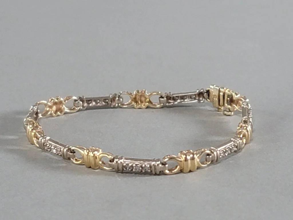 015 - Lot 256 - 14k gold and diamond bracelet.jpg