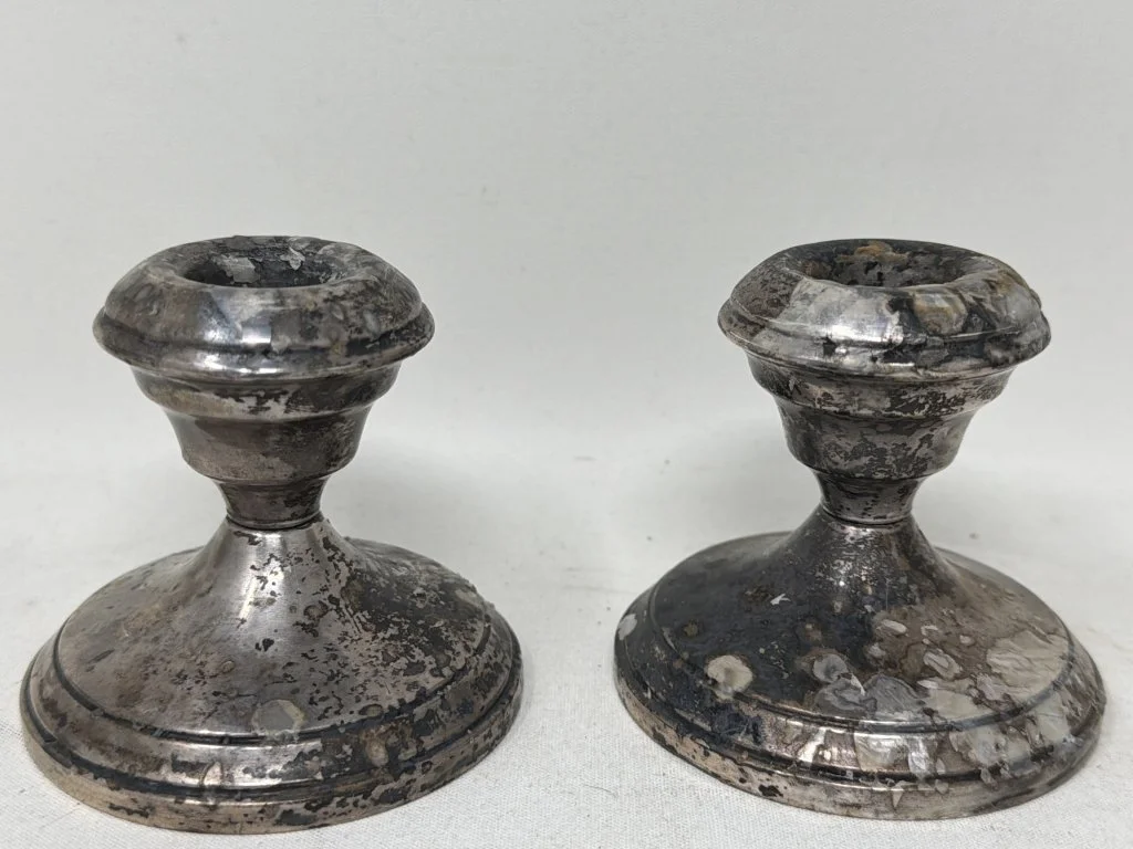 046 - Lot 159 - Pair of sterling silver weighted candlestick.jpg