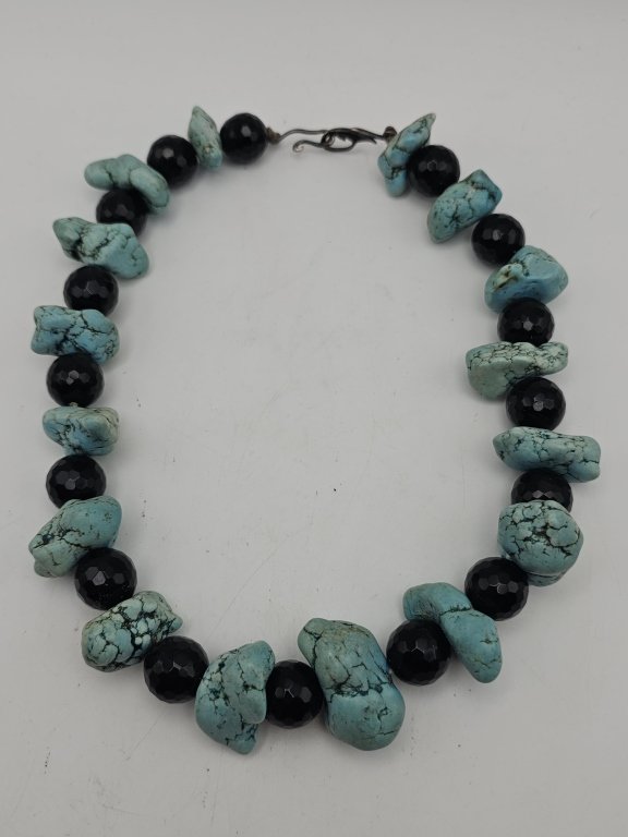 355h Chunky turquoise and faceted black onyx bead.jpg