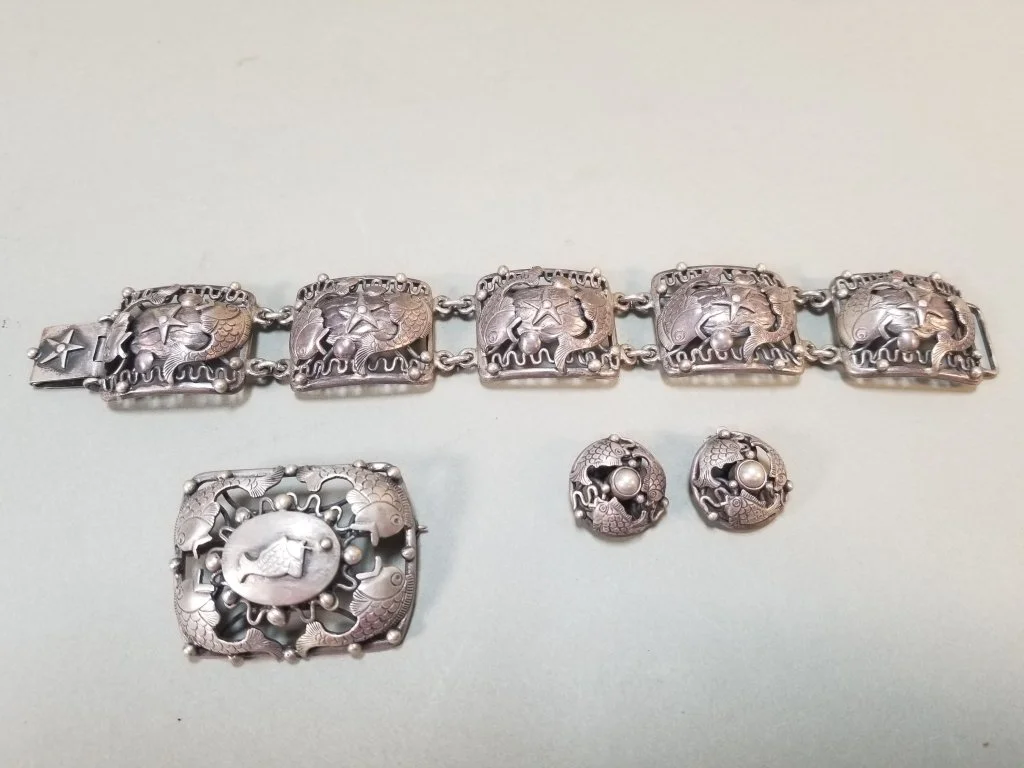 074_Lot_99_Danish_sterling_and_830_repousse_fish_parure_set.jpg