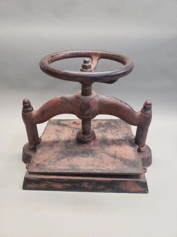 125_Lot_473_Antique_cast_iron_book_press.jpg