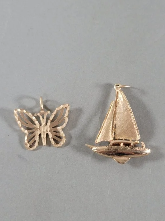 010 - Lot 345 - 14k gold sailboat, butterfly pendants.jpg
