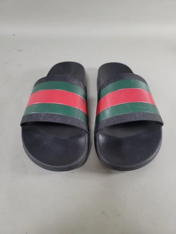 074 - 102 Gucci rubber slide sandals.jpg