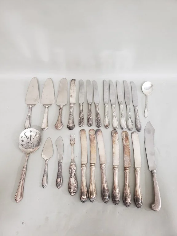 111_Lot_347_Sterling_silver-handled_flatware_group.jpg