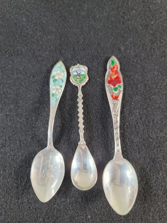 181 - Lot 115 - Three sterling silver and enamel souvenir spoons.jpg