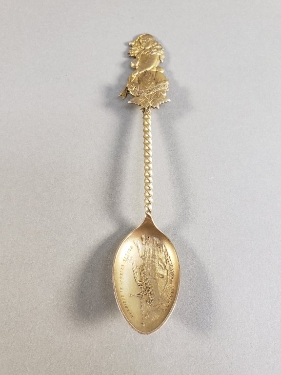 125 - Lot 587 - Sterling souvenir spoon Miss Canada.jpg