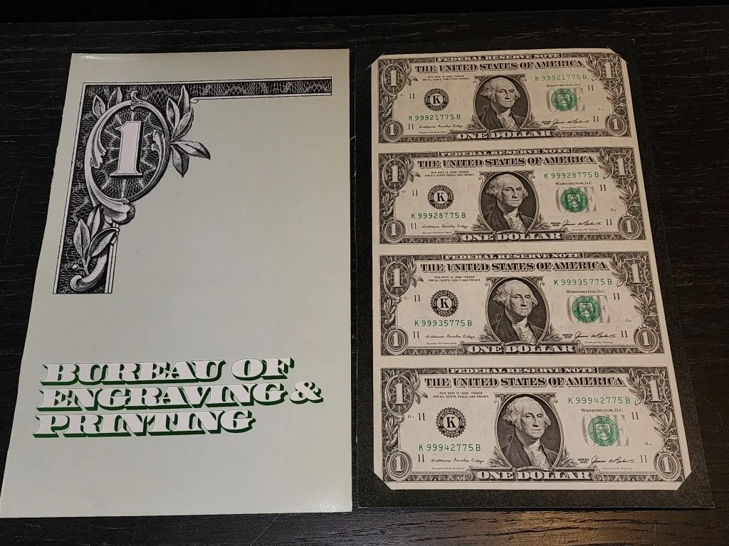 396h 1985 uncut sheet of one dollar bills.jpg
