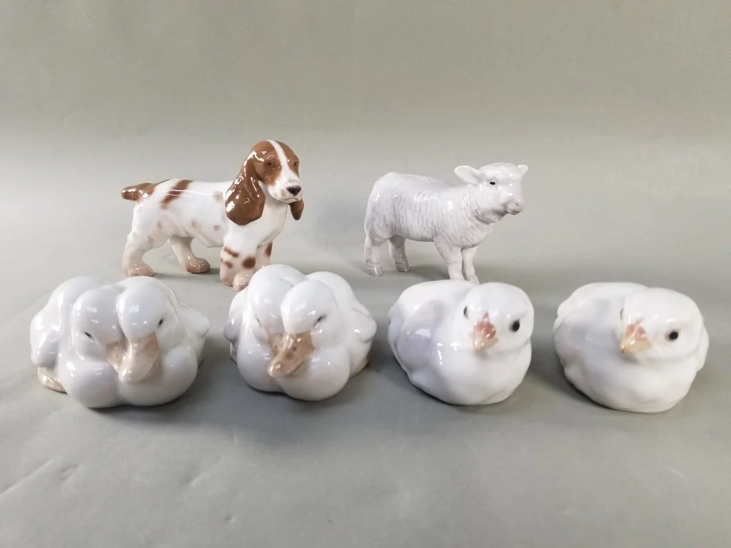 103_Lot_320_Group_of_royal_Copenhagen_porcelain_figurines.jpg