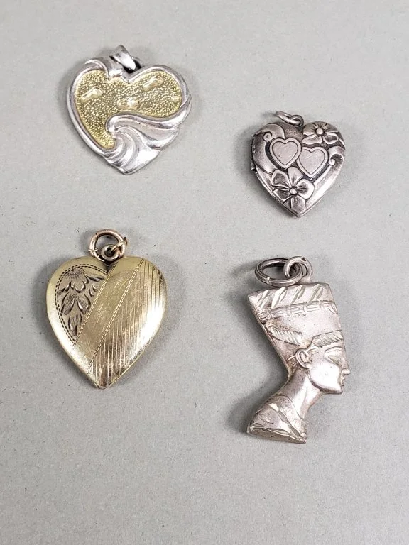 195 - Lot 277 - Group of sterling silver pendants.jpg