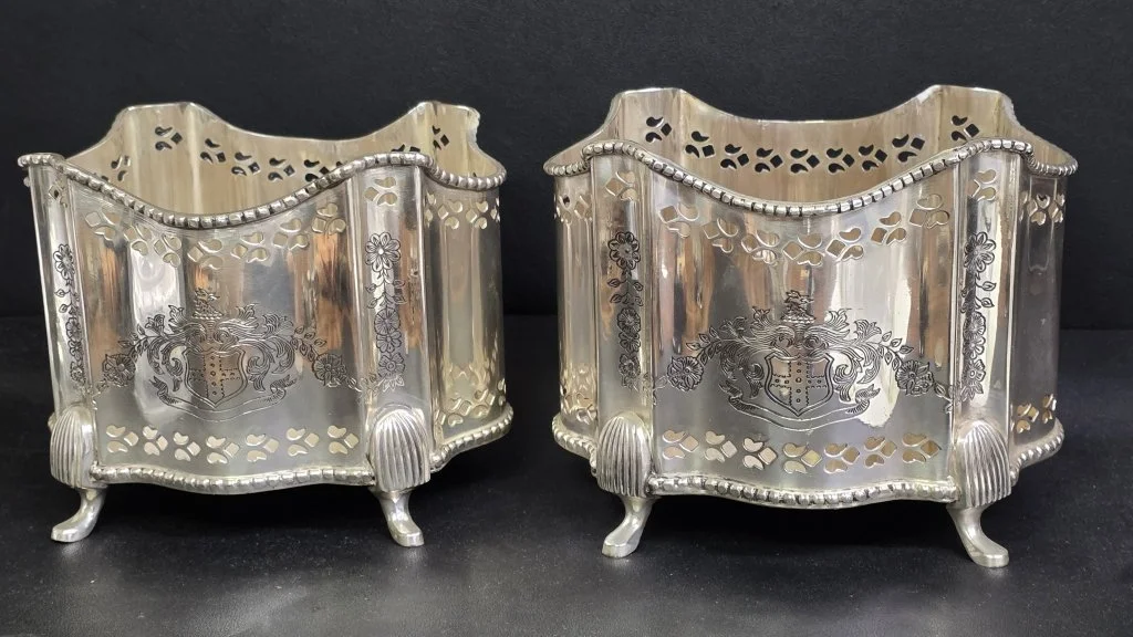 109_Lot_403_Pair_of_vintage_silver_plated_footed_cachepots.jpg
