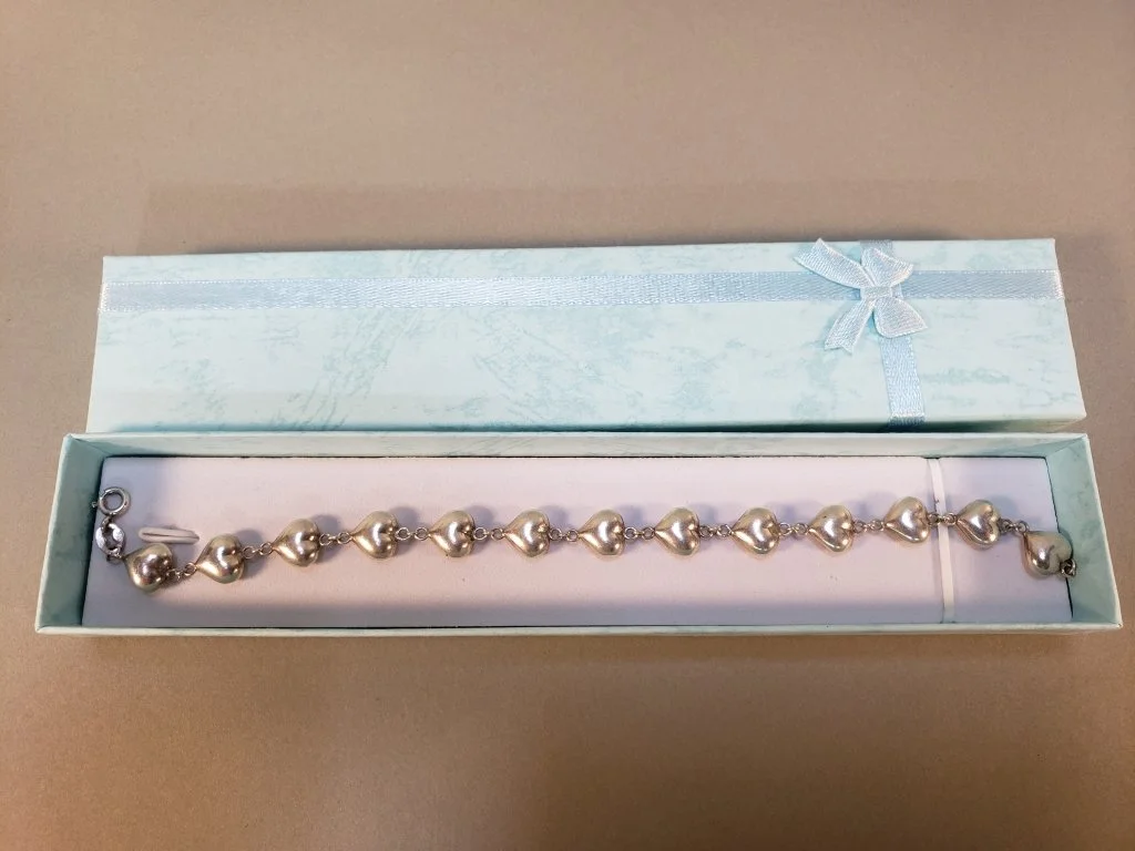 180 - Lot 58 - Sterling silver heart link bracelet.jpg