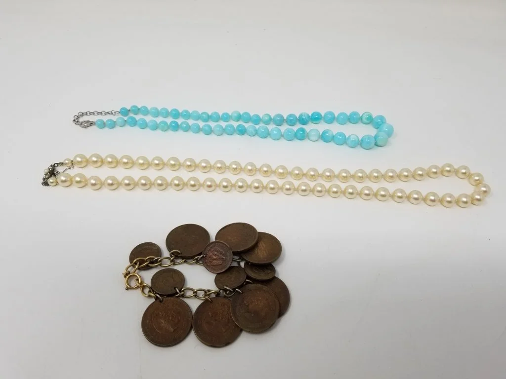 119 - Lot 643 - Handknotted Larimar stones with sterling clasp.jpg