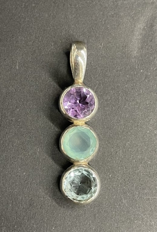 124 - Lot 600h - Sterling silver pendant with multi-stones.jpg