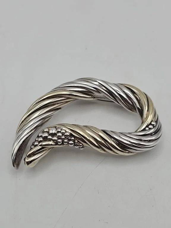 180_Lot_31h_Joe_Eustace_sterling_silver_and_gold_vermeil.jpg