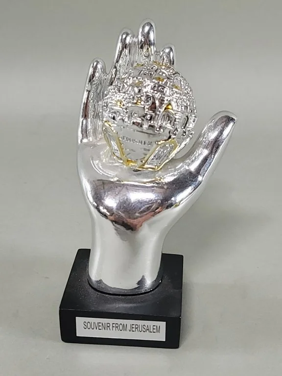 183 - Lot 489 - Sterling silver clad hand holding Jerusalem.jpg